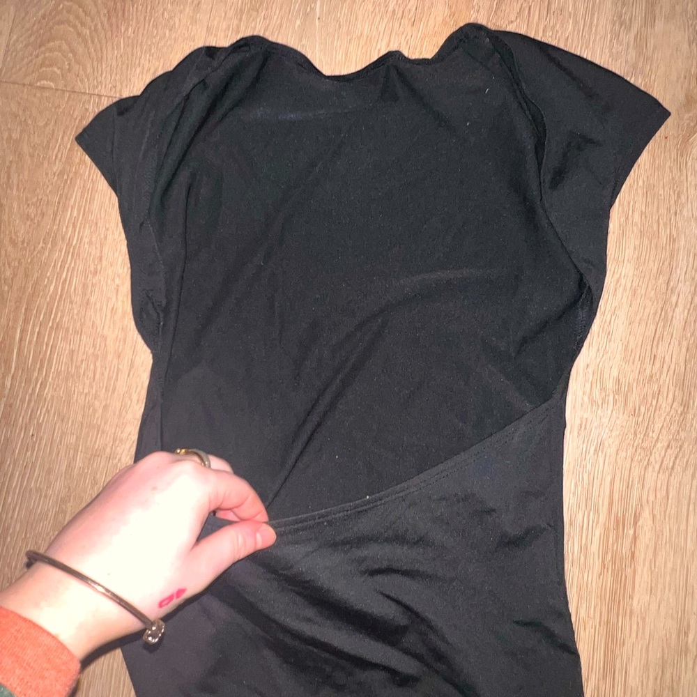 Backless black top.